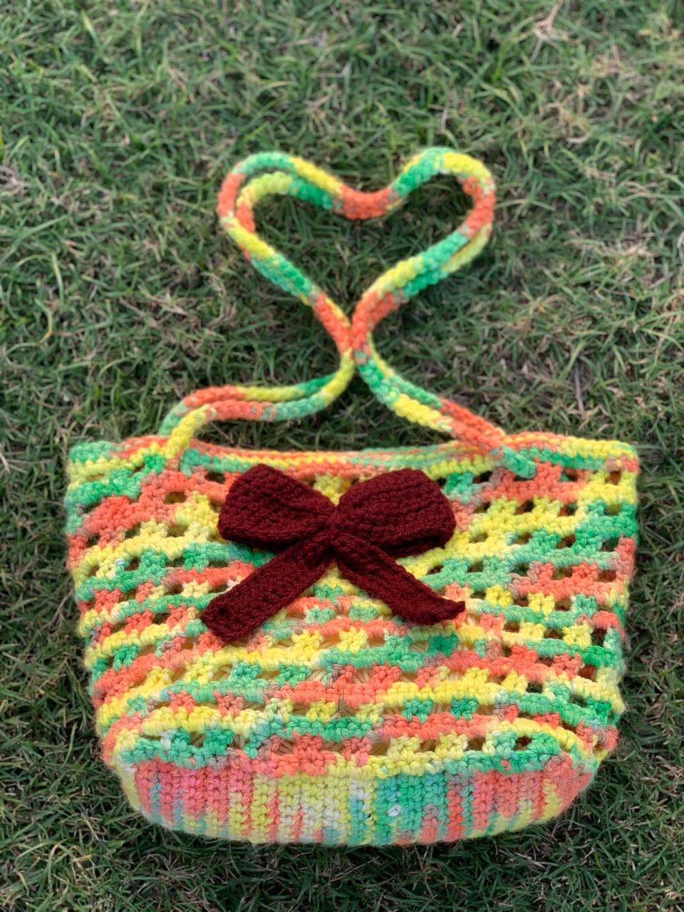 Multicolor Crochet Purse Bag with Maroon Bow – Stylish and Compact Accessory Bag