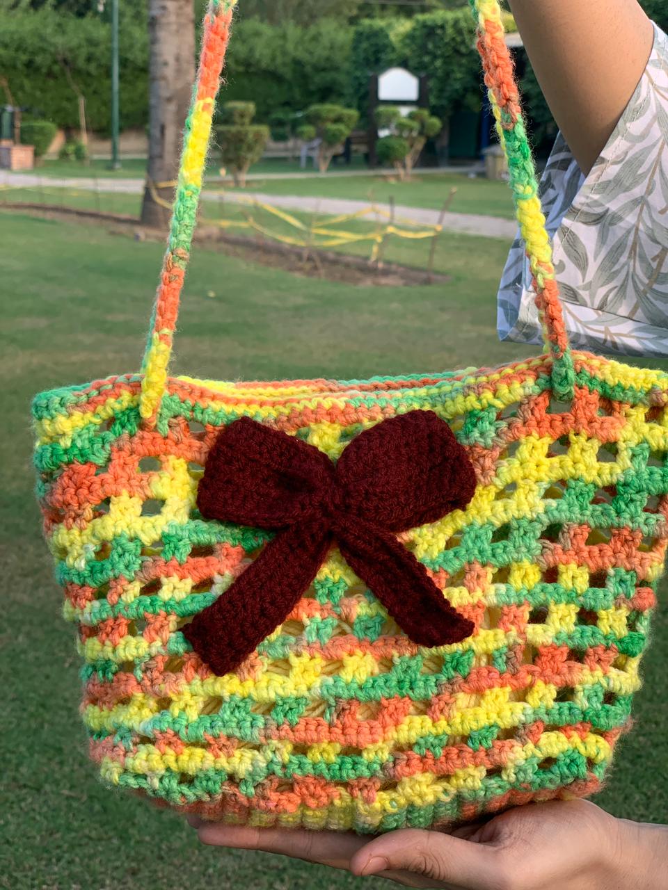 Multicolor Crochet Purse Bag with Maroon Bow – Stylish and Compact Accessory Bag