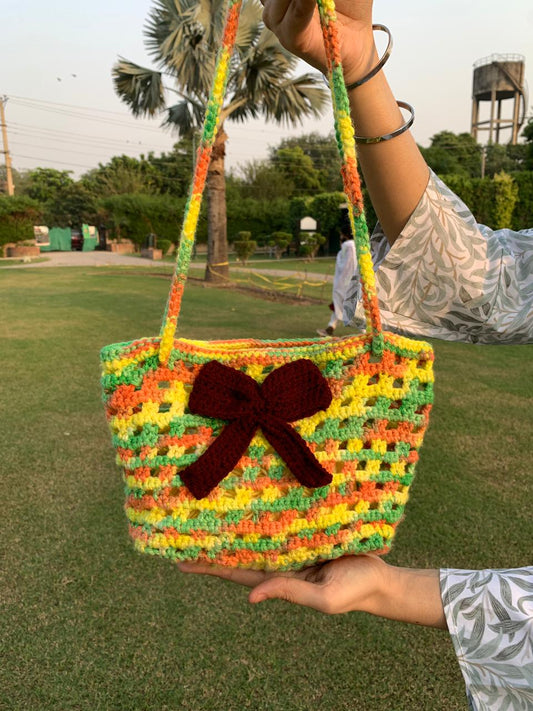 Multicolor Crochet Purse Bag with Maroon Bow – Stylish and Compact Accessory Bag